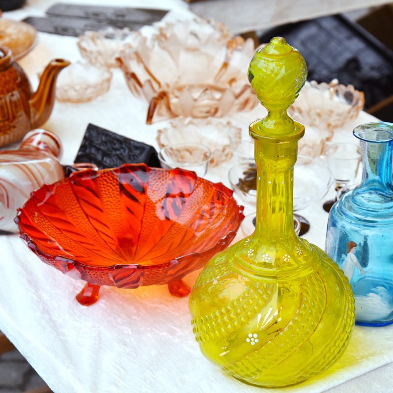 Set of glass decanter jug, vase, fruit stand old vintage glassware representing thrift shopping in Livonia.