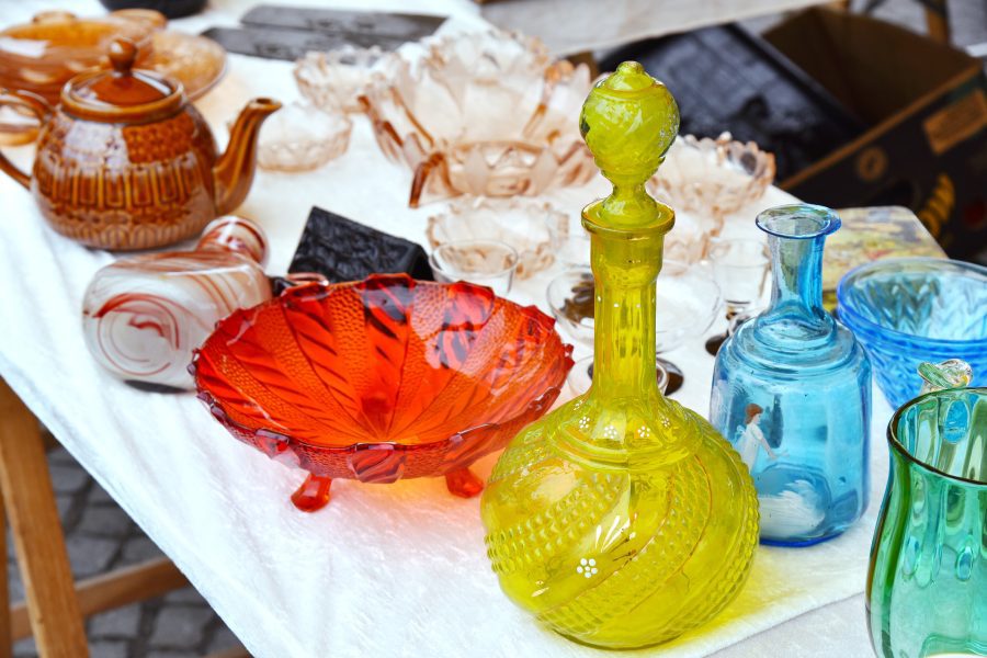Set of glass decanter jug, vase, fruit stand old vintage glassware representing thrift shopping in Livonia.